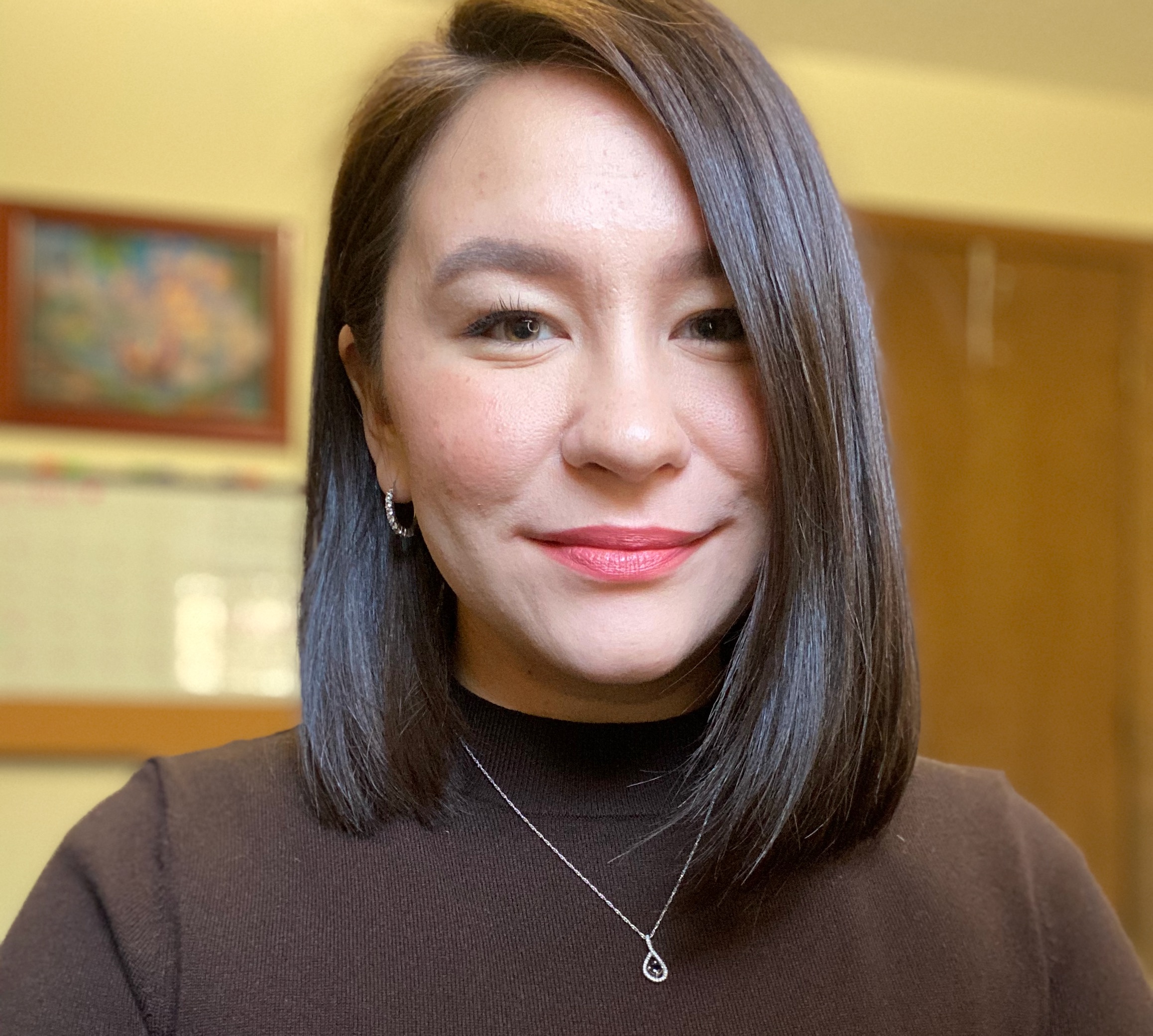 Image of Pamela Hammond in a brown turtleneck sweater